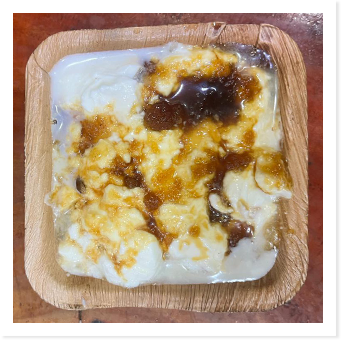 Kumol Saulor Jolpan with curd and jaggery